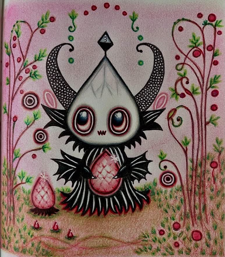 Ballpoint pen drawing of a cute little vampire creature with curled dotted horns, big red eyes, tiny fangs and bat wings on a pink colored pencil background in a sketchbook