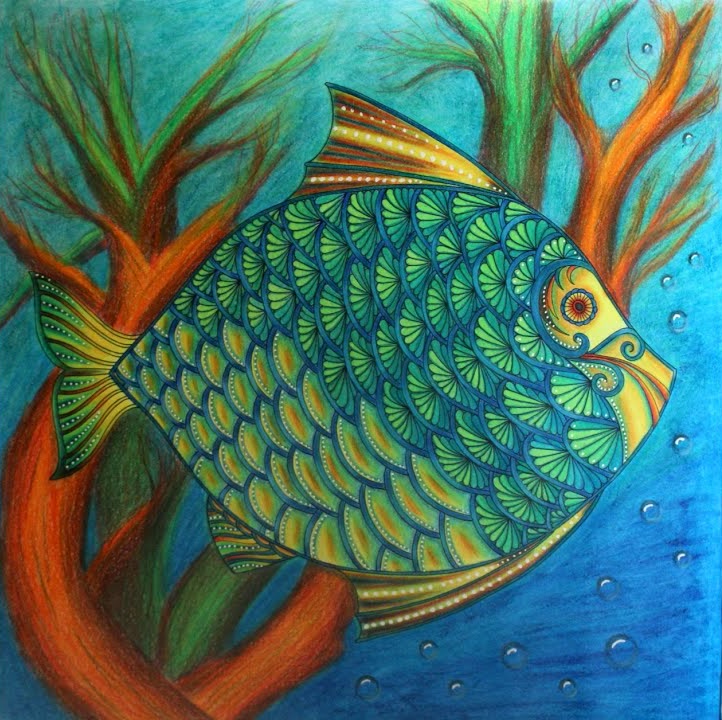 The finished Lost Ocean page: a large fish with turquoise and green fan-shaped scales, yellow dotted fins and a curled yellow face, between orange and green coral branches in deep blue water with bubbles