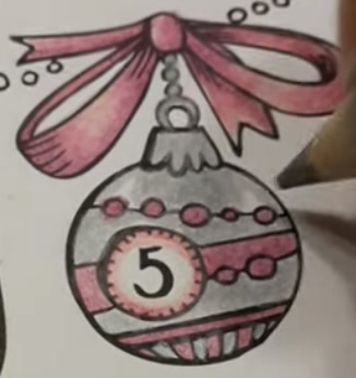 Colored pencil Christmas ornament from Rita Berman's advent calendar coloring page: a round bauble with a big pink bow, mauve stripes, silver shading and the number 5